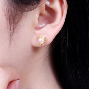 S925 silver triangle freshwater pearl earrings featuring a minimalist geometric design