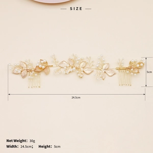 Detailed view of bridal hair accessory with golden leaves and pearls, size 24.5cm by 5cm