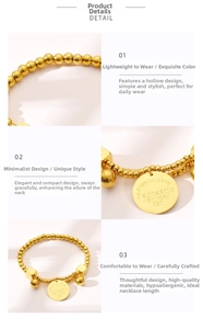 Detailed close-up of golden bead chain necklace with engraved Eternal Love circular pendant