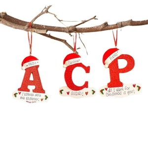 Sparkly red acrylic Christmas alphabet ornaments with Santa hats and message tags