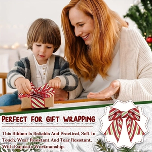 Detail of soft red and green striped ribbon bow used for festive gift wrapping
