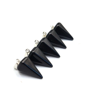 Close-up of five black agate hexagonal cone pendants with polished silver metal clasps