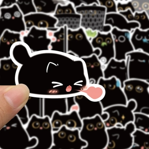 Close-up of waterproof PVC black cat stickers showing print quality and die-cut edges