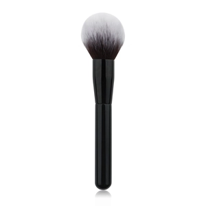 Close-up of soft flame-shaped makeup brush with black and white gradient bristles