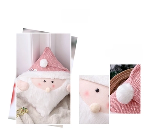 Close-up of pink sequin Santa pillow featuring plush white beard and knit details