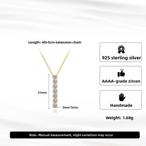 Detailed view of gold plated 925 sterling silver vertical bar pendant with 7 zircon stones