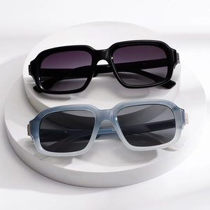 Classic square frame aviator sunglasses with black and blue gradient lenses on white display