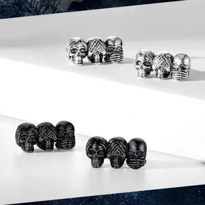 Gothic punk three skull stud earrings in silver and black finishes for Halloween