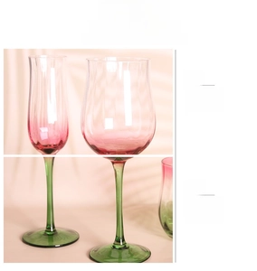Macro detail of hand-blown gradient wine glass featuring vertical ribbed texture and thin rim