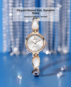 Close-up of rose gold watch with swan logo, sunray dial and marble inlay bracelet