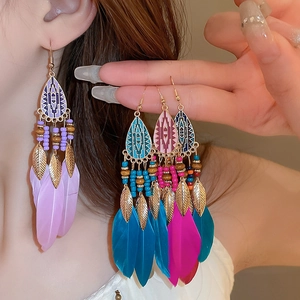 Bohemian feather drop earrings with colorful beads and vintage ethnic leaf pendants