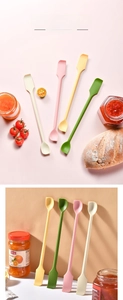 Macro shot of double-headed silicone jam spatulas with spoon tips in four pastel colors