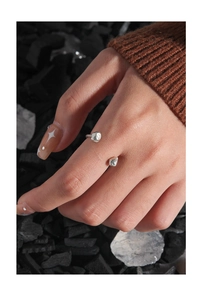 Detailed view of silver S925 sterling silver open ring with irregular textured stone