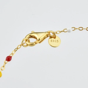 Detailed macro view of S925 sterling silver lobster clasp and colorful zircon beads