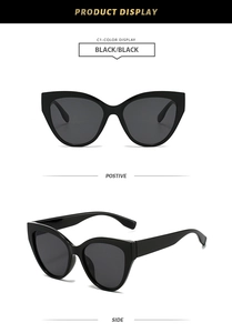 Detailed front and side macro view of black cat eye sunglasses with dark lenses