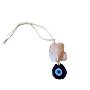 Pink raw crystal pendant necklace with woven wire and blue glass evil eye charm
