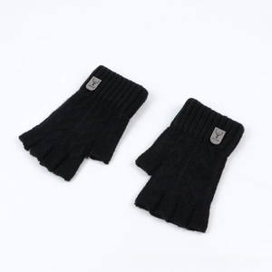 Detail of black knitted fingerless gloves with a deer leather patch and ribbed cuffs