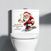 Christmas toilet seat sticker featuring Santa on a skateboard with festive text