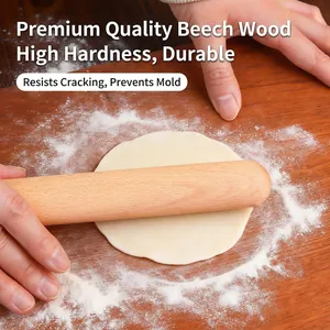 Premium beech wood rolling pin on wooden board with dough for baking and dumpling making
