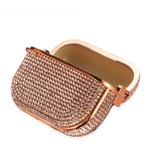 Close-up of champagne crystal studded protective case for AirPods Pro with metallic trim