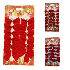 Detail showing twelve piece Christmas tree bow sets in red, gold, and silver finishes