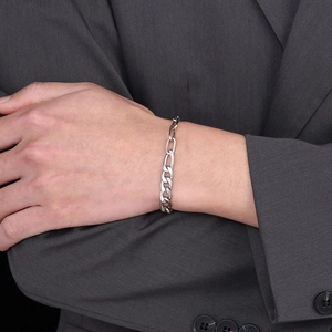 Polished silver Figaro link chain bracelet for men in minimalist stainless steel style