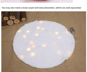 White faux fur snow carpet with warm yellow LED lights for Christmas tree decoration