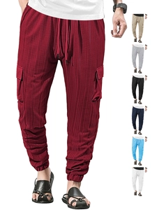 Detail view of cargo joggers for men in dark red with multi-color palette options
