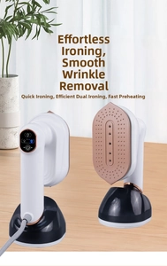 Detail view of portable garment steamer with digital display and rose gold metal soleplate