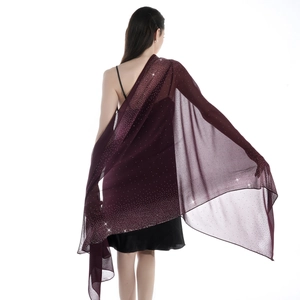 Elegant wine red chiffon shawl with sparkling rhinestones shown on a model's back