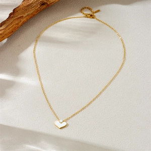 Minimalist gold stainless steel heart necklace with white shell inlay and diamond accent