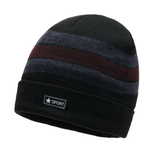 Detail view of winter knitted beanie with three-color stripes and Sport star patch