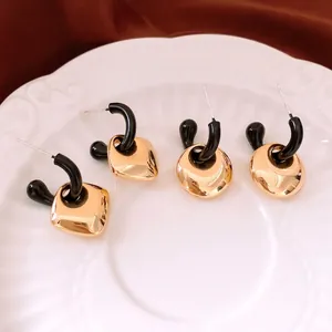 Minimalist geometric square and disc earrings in gold and black resin for women