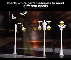 Detailed laser-cut paper scrapbooking accessories with vintage street lamps and bat motifs
