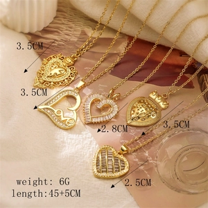 Detail view of five gold heart necklaces with zircon inlay and exact dimensions