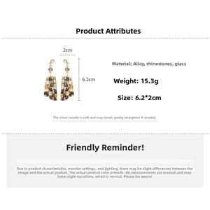 Detailed specs of gold crystal drop earrings with 6.2cm size and 15.3g weight