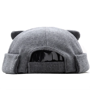 Detail of grey cat ear docker hat featuring adjustable velcro strap on back
