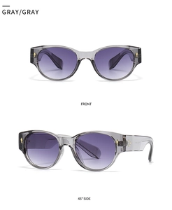 Detail view of transparent gray sunglasses with gradient lenses in front and 45-degree angle