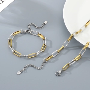Two-tone silver and gold twisted paperclip link chain necklace and bracelet jewelry set