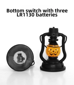 Detail of Halloween pumpkin lantern base showing ON/OFF switch and LR1130 battery slots
