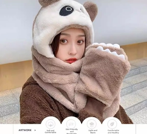 Detail of plush panda 3-in-1 hat with thick faux fur scarf and gloves for winter