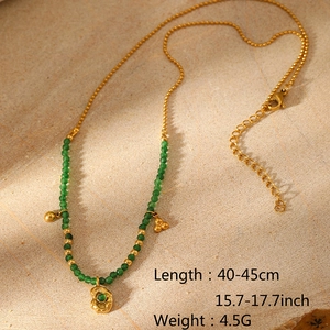 Detail of vintage green stone beaded necklace with irregular gold pendant and size specs