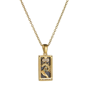 Macro detail of The Magician tarot card necklace pendant with blue zircon stones