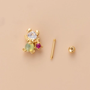 Gold stainless steel stud earring with sparkling round zircon and red star stone detail