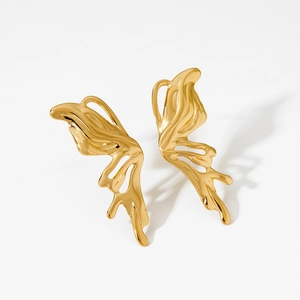 Polished gold butterfly wing earrings with a modern fluid design on a white background