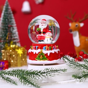 Giant Christmas crystal ball with Santa, snowman, music, and auto snow feature
