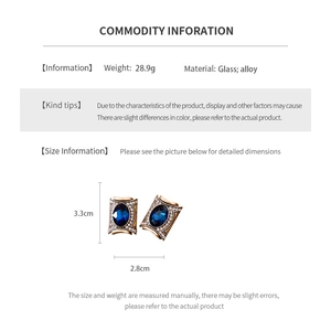 Detailed dimensions of the vintage blue oval earrings with size markings 3.3cm by 2.8cm