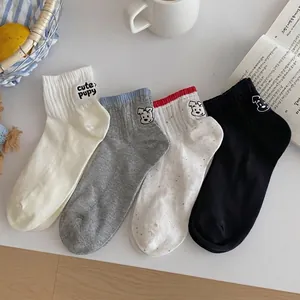 Four pairs of stylish summer cotton socks with cute dog embroidery in various colors