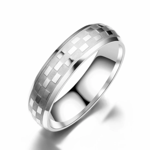 Macro shot of a 6mm silver titanium ring featuring a polished finish and etched grid pattern