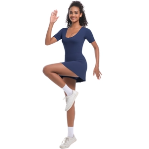 Slim fit navy blue short sleeve tennis dress with U-neck and built-in athletic shorts